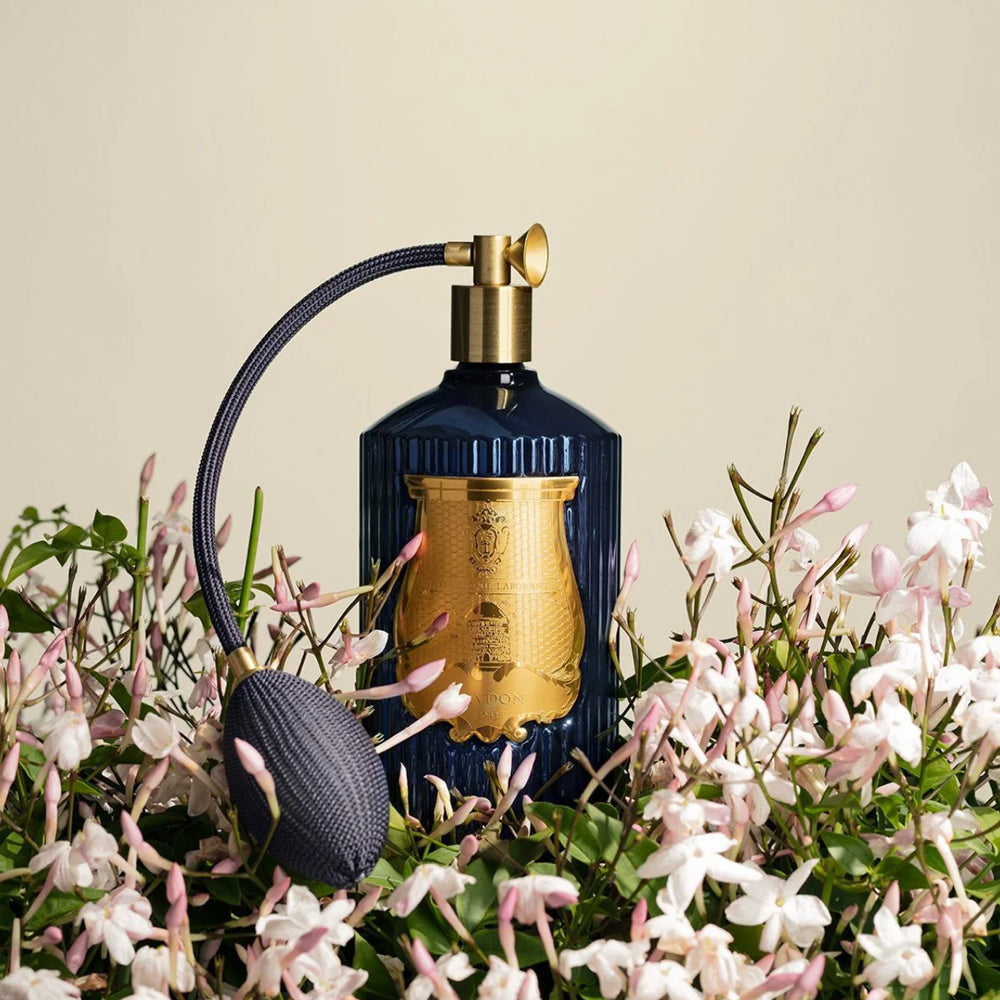 Trudon Room Spray Madurai in blue glass bottle.