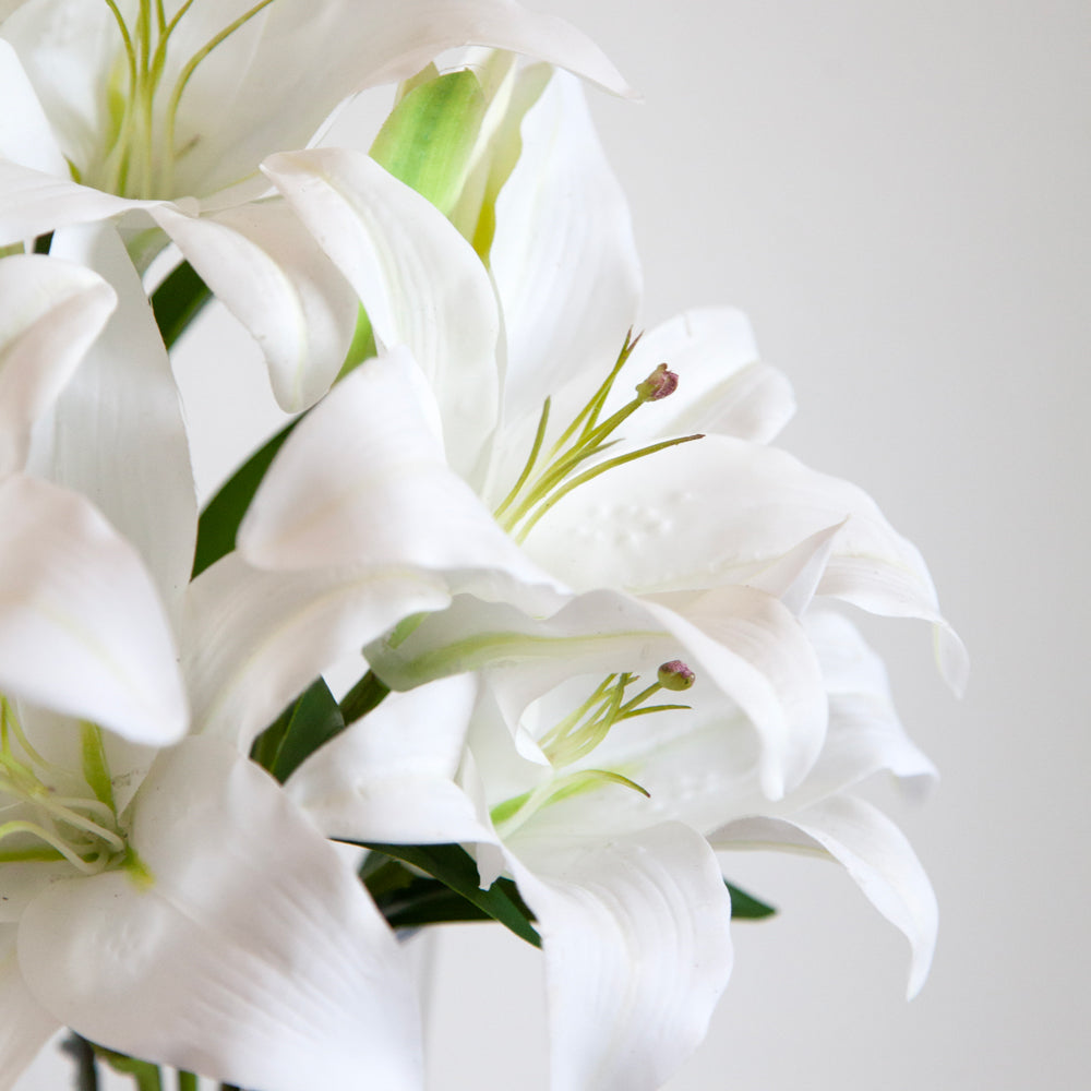 Artificial white lilies