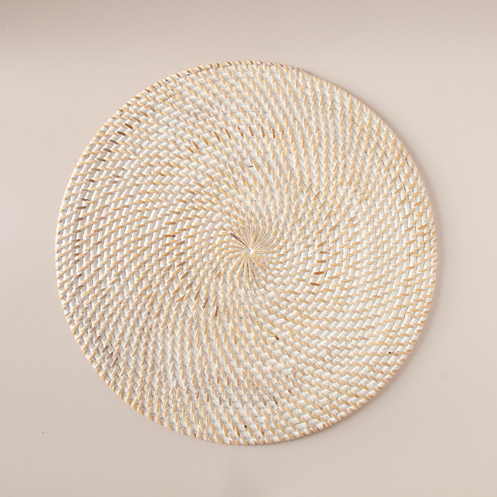 Whitewash rattan placemat viewed from above.