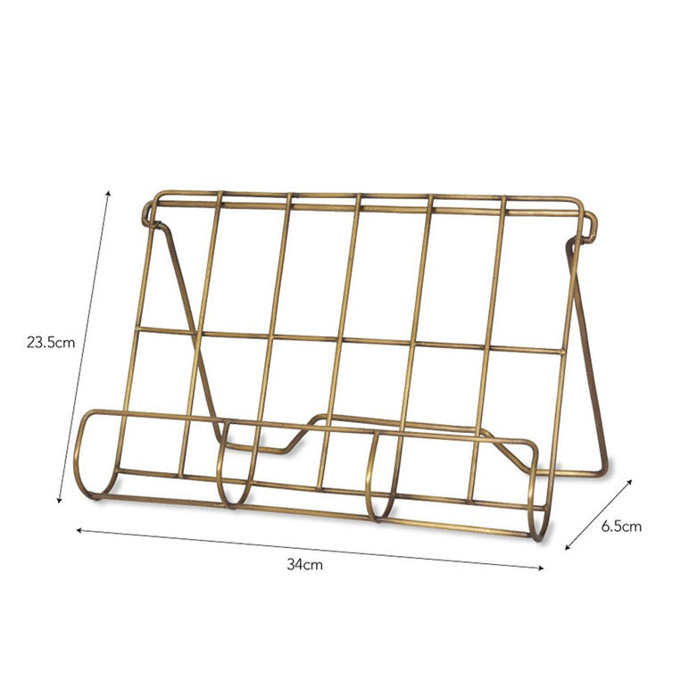 Wire cook book stand holder in antique brass finish.