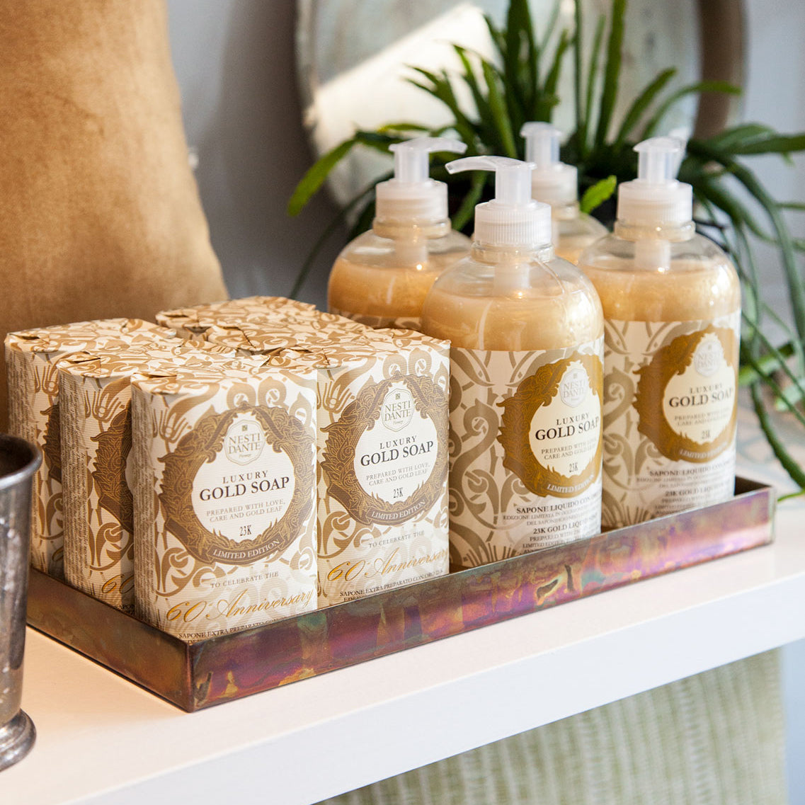 Nesti Dante Gold soap and hand wash on shelf.