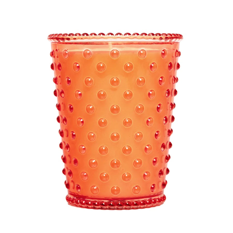 Simpatico orange coloured guava hobnail candle