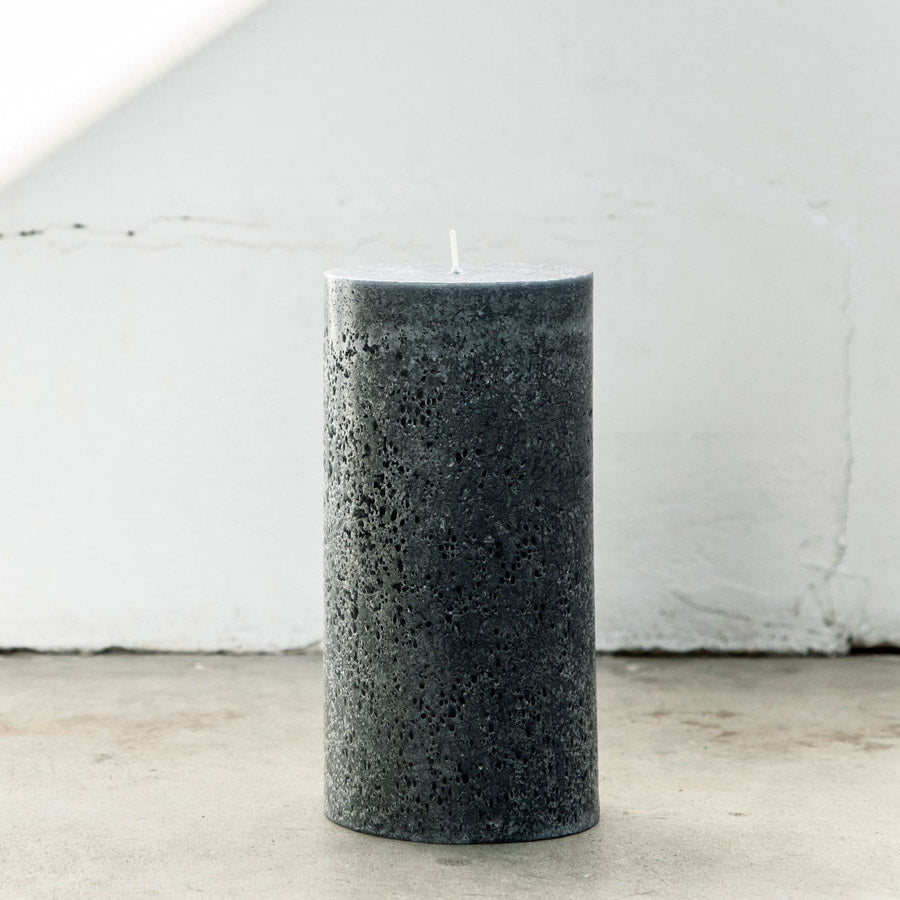 Textured pillar candle in charcoal.