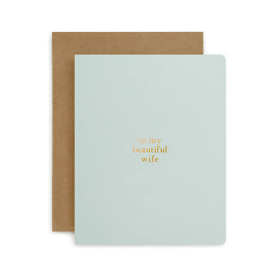 Small gold text on card reads "to my beautiful wife"