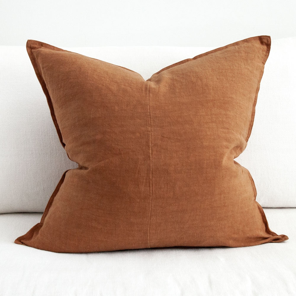 Amber coloured linen cushion