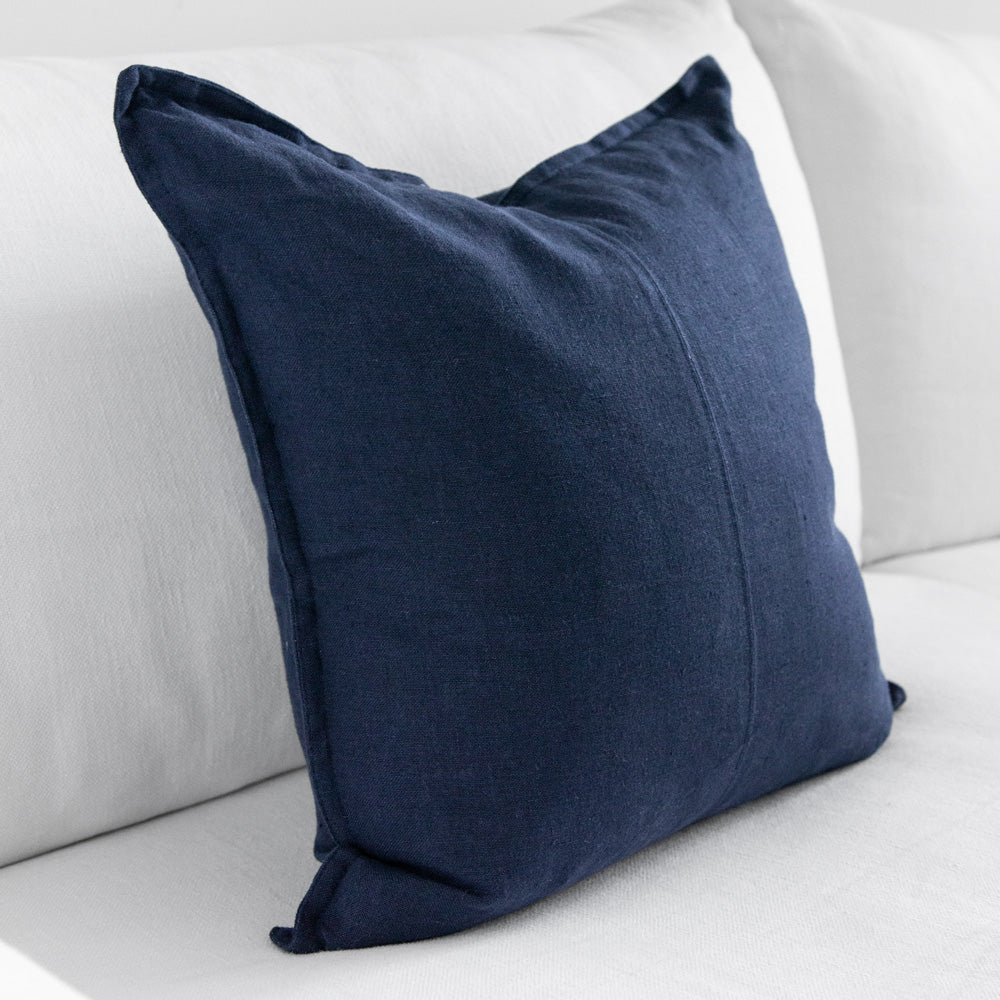 Square navy blue linen cushion.