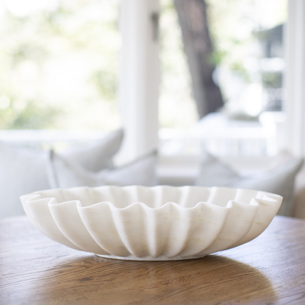 Large fluted oval marble bowl. 