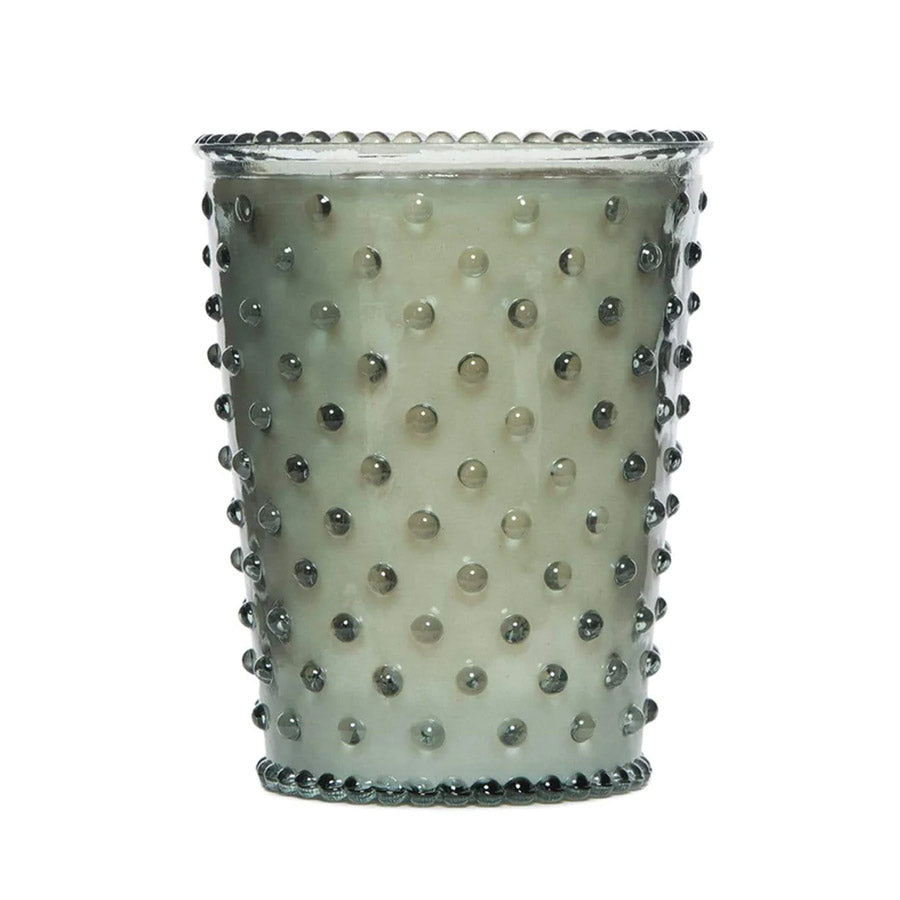 Grey glass candle.