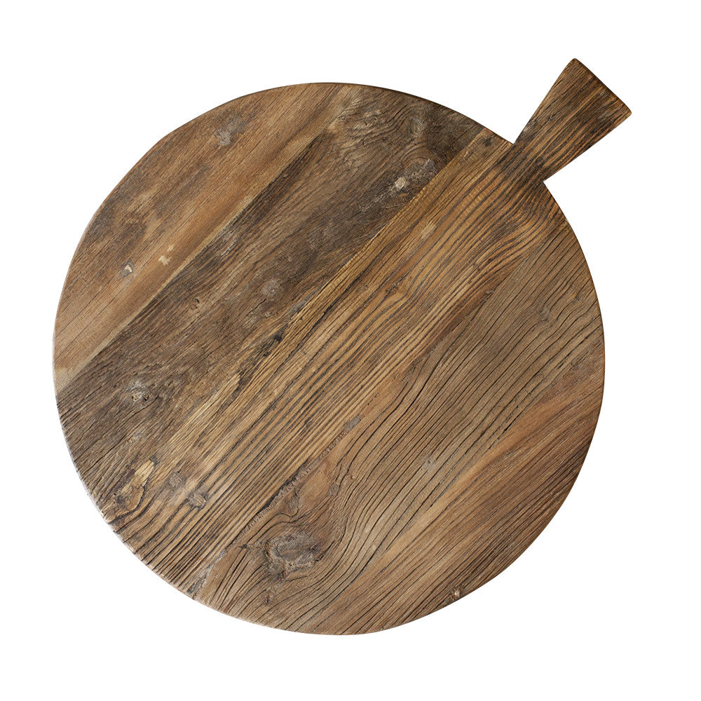 Large round wooden board.