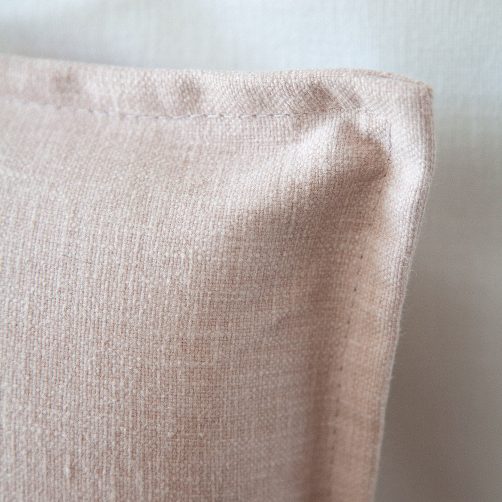 Close up corner detail of Loft fabric cover bedhead.