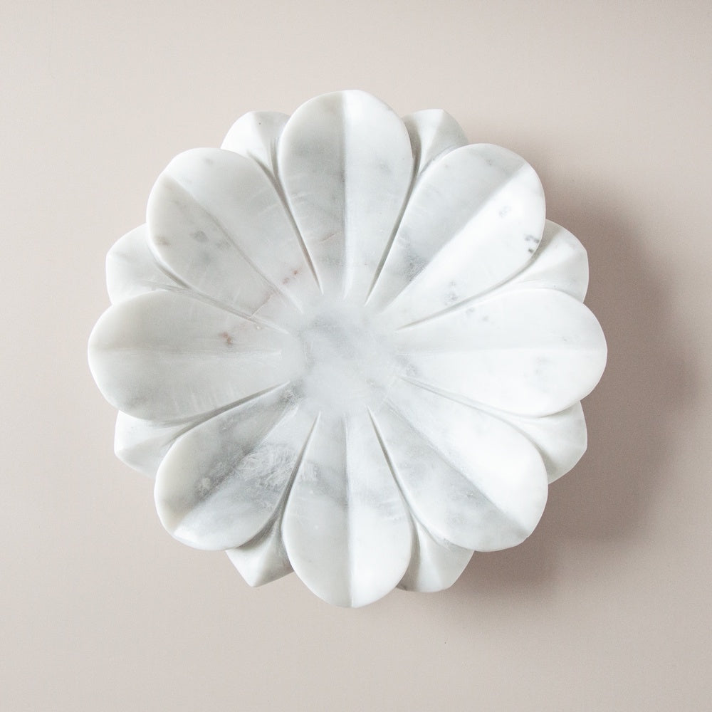 Marble bowl in the shape of a lotus flower.