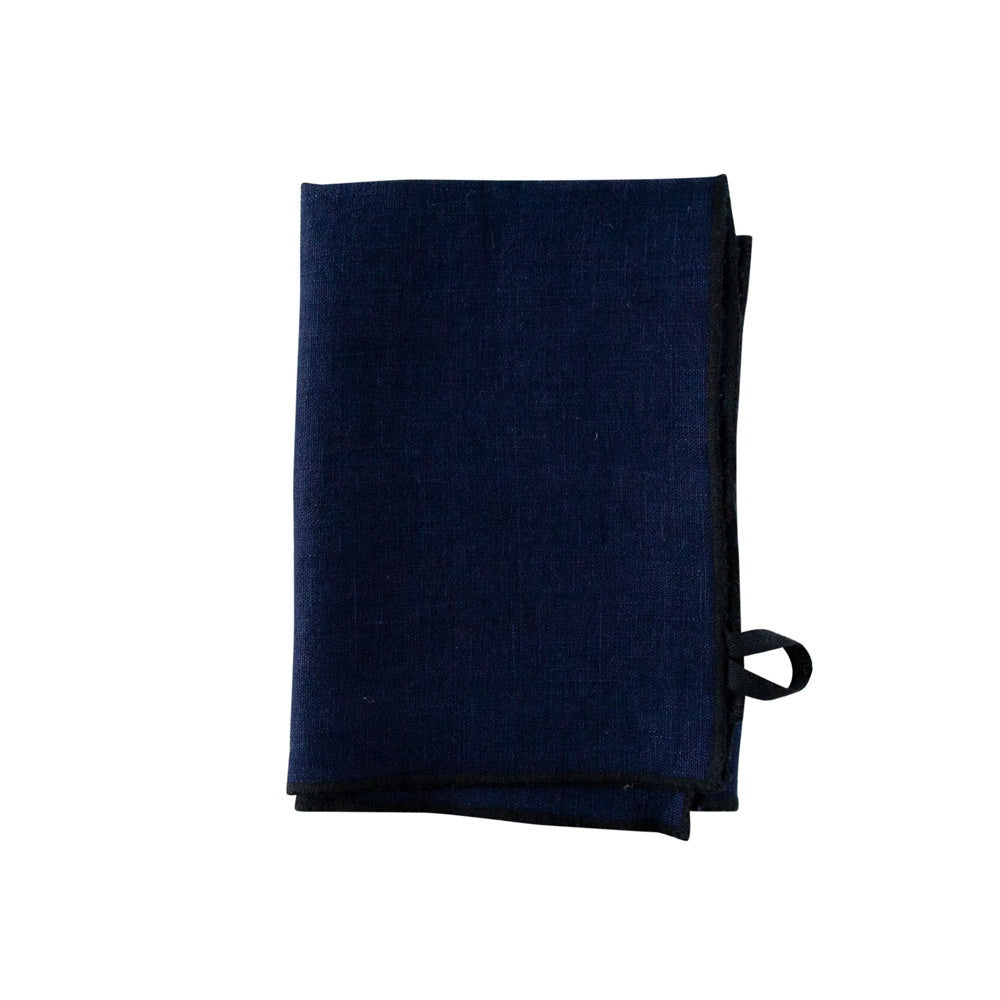 Dark blue linen tea towel with black hemmed edge and hanging loop.
