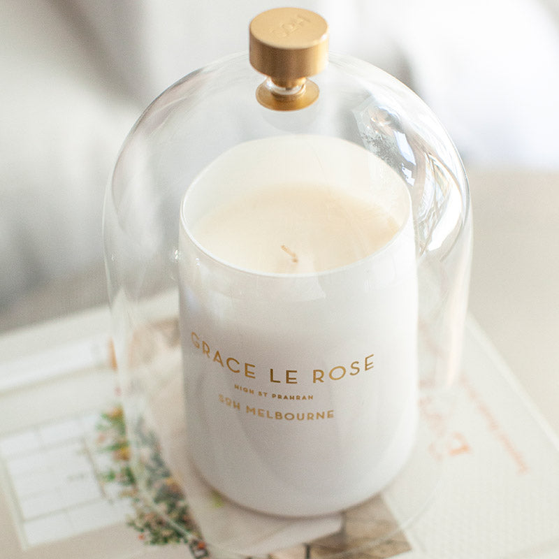 SoH Grace Le Rose candle under clear glass cloche.
