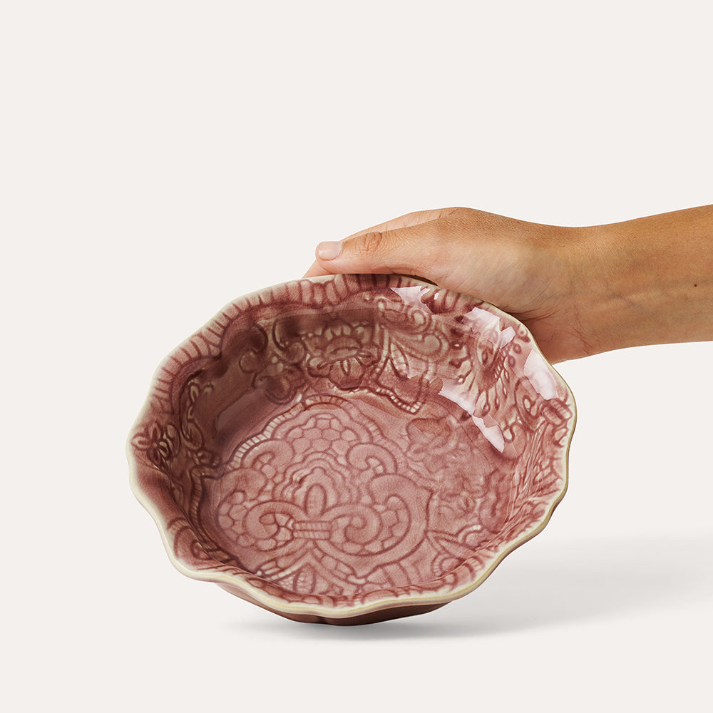 Sthål Arabesque small deep pink bowl with ruffled edges.