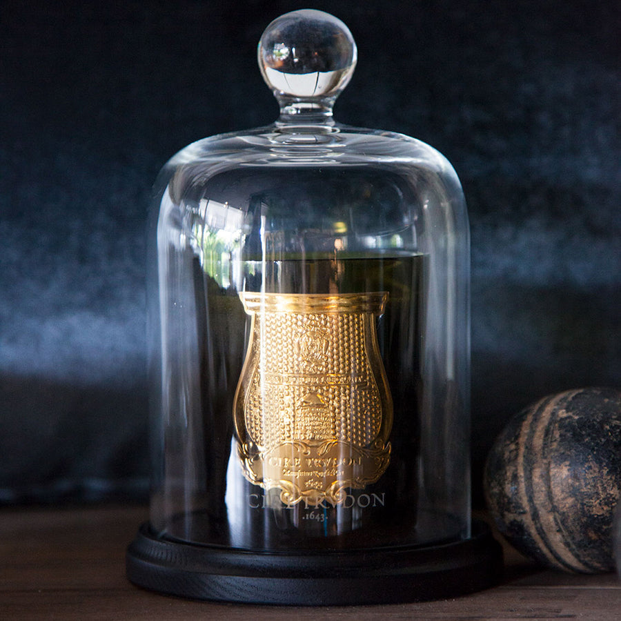 Trudon La Cloche set. Glass dome with black base with Trudon candle inside.