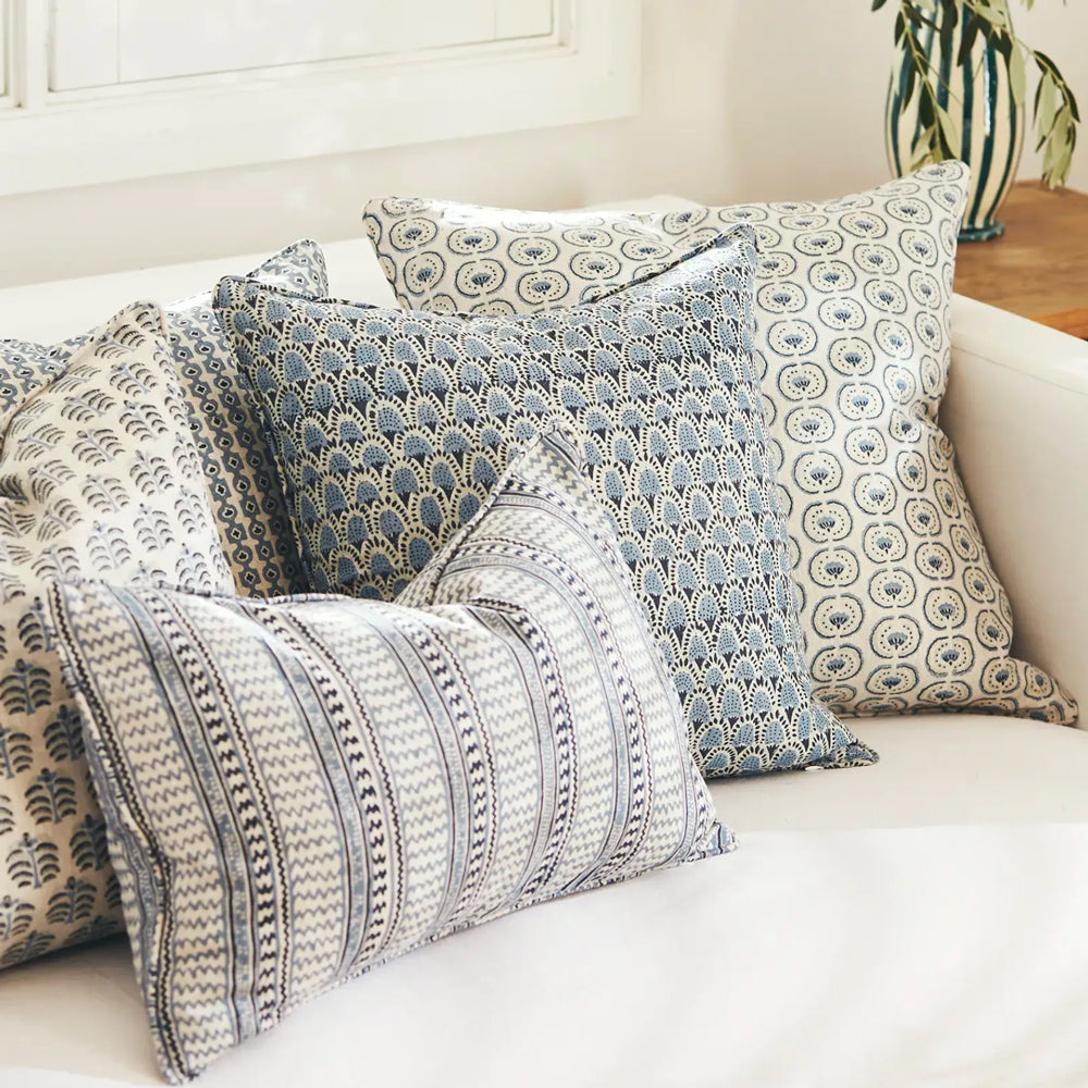 Blue Walter G cushions on sofa.