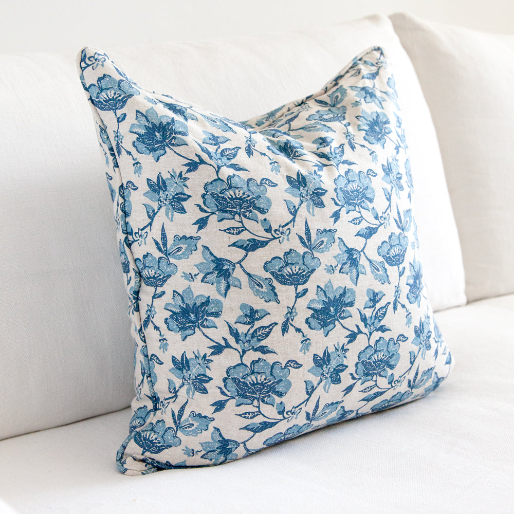 Walter G Java Riviera Cushion featuring a blue floral design.
