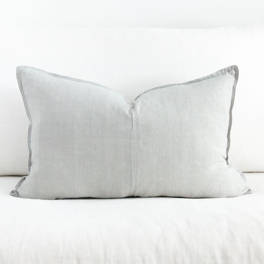 Rectangular light grey linen cushion.
